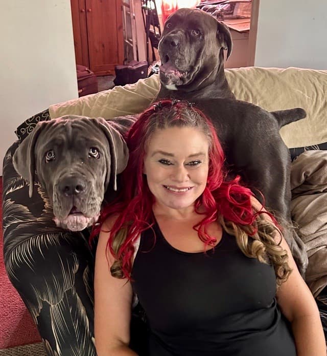 Stephanie Hinds, owner of Good Dogz Rule, with her Cane Corsos